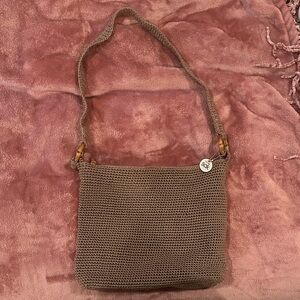 The Sak brown knit shoulder bag bamboo detail beachy coastal